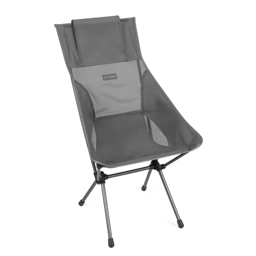 Helinox Campingstuhl Sunset Chair mit hoher Rückenlehne und Kopfstütze - charcoalgrau - Entspanne im Freien mit dem Sunset Chair. Hohe Rückenlehne und verstellbare Kopfstütze bieten optimalen Komfort, während die praktischen Seitentaschen nützlichen Stauraum bieten. Ideal für Camping, Ausflüge und entspannte Tage am See.