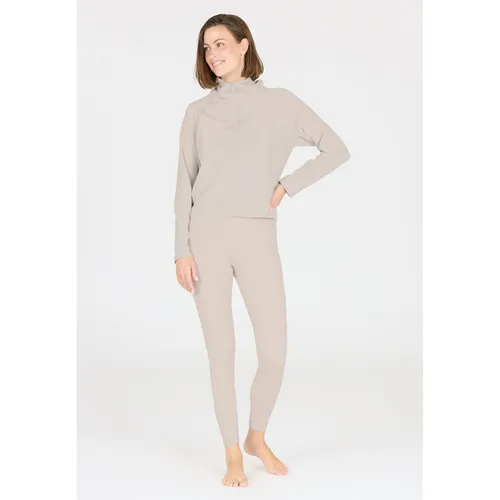 Athlecia Sport-Leggings Aliya Tight - Beige Damen, Größe 36 - Fitnessbekleidung für Yoga, Pilates und Laufen. Die atmungsaktive Leggings bietet optimalen Komfort durch feuchtigkeitsregulierendes Material und reflektierende Elemente für Sicherheit bei Dämmerung.