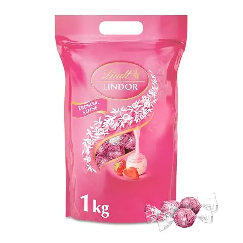Lindt Lindor XXL Beutel Erdbeer Sahne Weiße Schokolade Pralinen 1kg - Schokoladenbonbons & Pralinen, verführerische weiße Schokolade mit fruchtiger Erdbeer-Sahne-Füllung für ein unvergessliches Geschmackserlebnis.