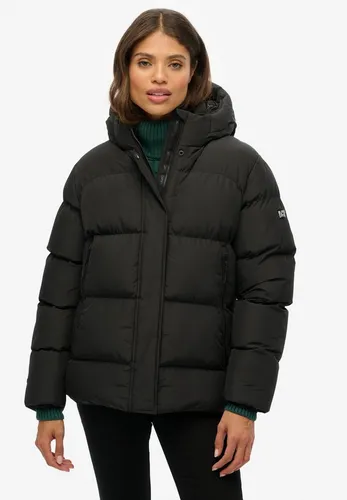 Superdry W5012004A Kapuzenmantel 5 Baffle Sports schwarz (L) - Lässiger Kapuzenmantel mit 5 Baffeln in Schwarz, aus recyceltem Polyester. Ideal für kühle Tage, bietet Komfort und Stil. Verstellbare Kapuze und Saum sorgen für individuelle Anpassung.