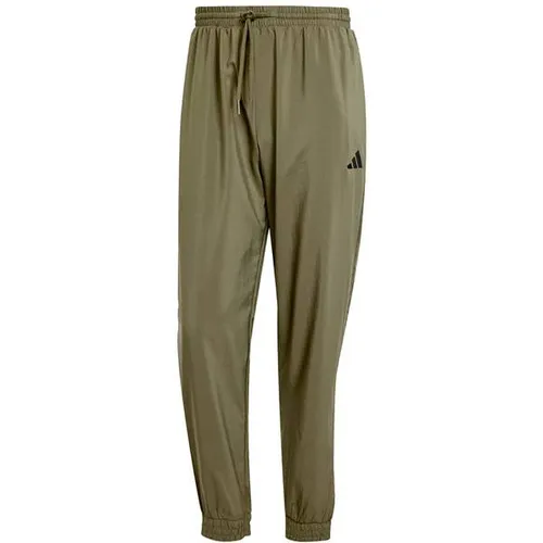 adidas Herren Essentials SMALL Logo Stanford Pant - Trainingsbekleidung mit elastischem Bund und Reißverschlusstaschen, ideal für Komfort und Funktionalität beim Sport.