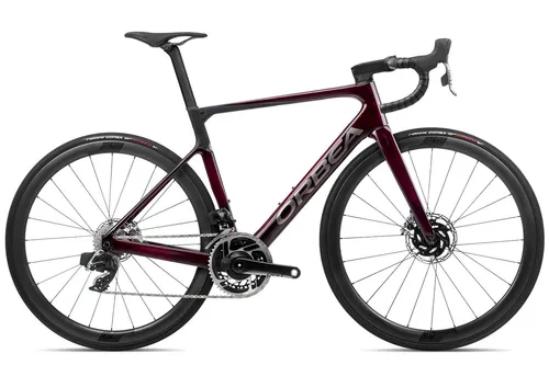 Orbea Orca M11eLTD PWR - Hochleistungs-Rennrad in Rotwein und Raw Carbon - Rennrad mit OMX Carbon-Rahmen für maximale Geschwindigkeit und Performance – ideal für anspruchsvolle Fahrer.