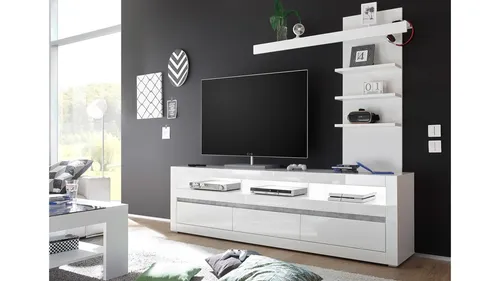 Hochglanz Wohnwand Set Carat 2-teilig in Weiß - Elegante Anbauwand für das Wohnzimmer, bestehend aus Lowboard und Regal. Mit hochglänzender Oberfläche und einfacher Montage. Perfekt für stilvolle Unterhaltungselektronik.