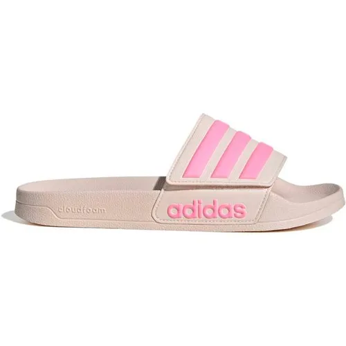 adidas Unisex Adilette Shower Slides Sandal – Bequeme Badesandalen in Wonder Quartz/Bliss Pink - Stylische und bequeme adidas Adilette Shower Slides für den perfekten Komfort am Pool oder Strand. Ideal für entspannte Tage und Freizeitaktivitäten.