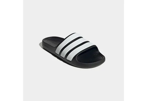 adidas Unisex Adilette Flow Slides - Dusch- & Badeschuhe für Herren mit regulärer Passform und einteiliger, vorgeformter Konstruktion für besten Tragekomfort und Style.