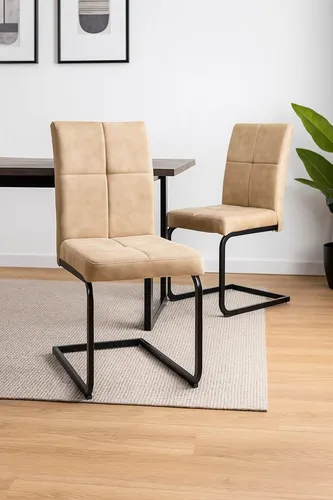 Moderner Schwingstuhl 2er-Set in creme/schwarz - Elegantes 2er-Set gepolsterter Schwingstühle für Ihr Esszimmer. Mit hochwertigem Stoffbezug und pulverbeschichtetem Metallgestell bietet es Komfort und Stil in einem.