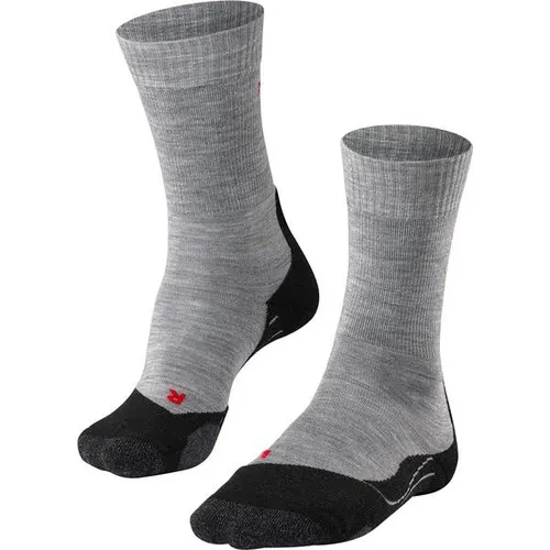 FALKE Damen Wandersocken TK2 Explore W - Sportsocken aus atmungsaktiver Merinowolle, ideal für Outdoor-Aktivitäten. Die 3-lagige Sohlenkonstruktion sorgt für trockene Füße und hohen Tragekomfort ohne Druckstellen.