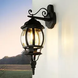 Licht-Erlebnisse Wandlaterne Außen BREST in Schwarz - Rustikale Außenwandleuchte im Landhausstil, witterungsbeständig und mit breiter Lichtstreuung für mehr Sicherheit auf Wegen und Grundstücken.
