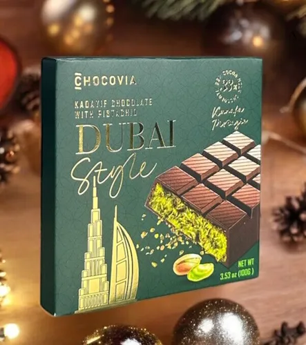 Dubai Style Schokolade 100g mit Pistaziencreme - Genießen Sie die süße Kombination aus Schokolade und Pistaziencreme in dieser feinen Praline. Ideal für Naschkatzen und als Geschenk!