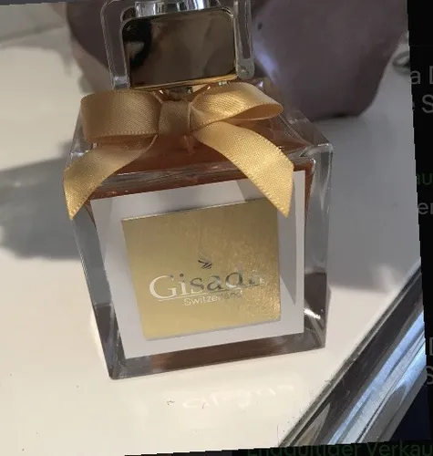 Gisada Donna Edt Spray 100 ml - Damenduft mit blumigen Noten, ideal für den täglichen Gebrauch und ein Hauch von Eleganz.