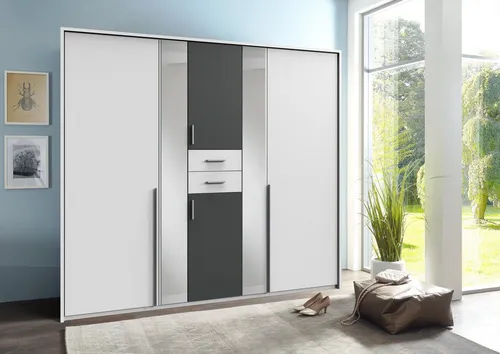Kleiderschrank Vanea Drehtürenschrank mit Spiegel 225 cm - Moderne Kleiderschränke für Erwachsene, ausgestattet mit Drehtüren, Kleiderstange und Schubfächern – ideal für stilvolle Schlafzimmer.