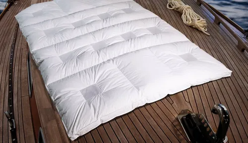 Sanders ClimaBalance Daunendecke Premium 135x200 cm warm - Bettdecken mit patentierter CLIMABALANCE® Technologie für ein optimales Schlafklima. Genießen Sie bis zu 50% längere Tiefschlafphasen und ein kuschelig warmes Gefühl dank hochwertiger Gänsedaunen.