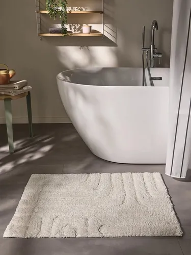 benuta Badematte Dan, 11 mm, rechteckig, handgeknüpft aus 100% Baumwolle - Die benuta Badematte Dan vereint stilvolles Design mit Funktionalität. Sie sorgt für warme Füße nach dem Duschen und ist pflegeleicht, perfekt für den Einsatz im Badezimmer.