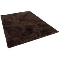 Pergamon Luxus Super Soft Fellteppich Plush Schoko 60x90cm - Extravagant und weich: Der Kunstfellteppich Plush aus hochwertigem Polyester verwandelt jeden Raum in eine Wohlfühloase. Ideal für Wohnzimmer und Schlafzimmer, sorgt er für Wärme und Gemütlichkeit.