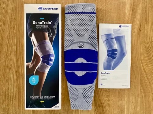 Genutrain Kniebandage Größe 4 titan - Kniebandage zur Stabilisierung und Schmerzlinderung, mit Omega Pelotte für verbesserte Durchblutung und schnellere Genesung. Ideal für aktive Menschen!