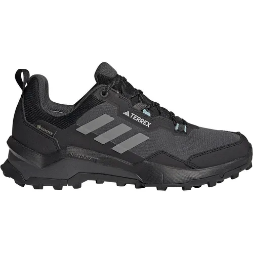 Adidas TERREX AX4 GORE-TEX Wanderschuh - schwarz - Wasserdichter Wanderschuh für Outdoor-Abenteuer, mit atmungsaktiver GORE-TEX Membran und überragendem Grip durch Continental Gummi.