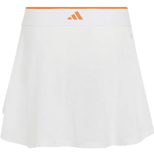 ADIDAS Kinder Rock G WOW SKIRT PRO - Sportlicher Tennisrock aus atmungsaktivem Mesh-Material, ideal für junge Athleten. Die innovative Climacool Technologie sorgt für ein angenehmes Tragegefühl, während die modische Tulpenform Eleganz und Bewegungsfreiheit bietet.
