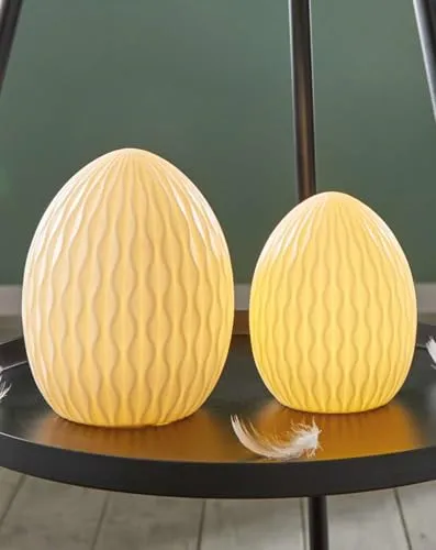 Dekoleidenschaft 2X LED Dekofigur Osterei aus Porzellan, weiß, 11 + 14 cm hoch, Leuchtdeko, Osterdeko, Porzellanfigur