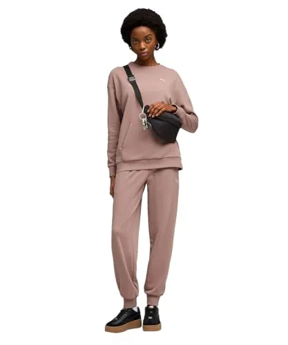 Puma Relaxed Sweat Suit TR cl sandstone (88) M - Stylischer Damen Sweat Suit von Puma aus 50 % recycelten Materialien. Der entspannte Schnitt und das weiche French Terry sorgen für hohen Komfort und einen lässigen Look – ideal für Freizeit und Sport!