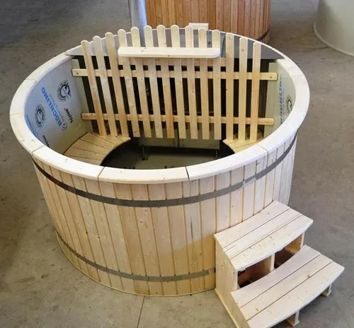 Outdoor-Spa Hot Tub Whirlpool Badefass - Entspannung für 5 Personen - Runder Whirlpool mit einem Durchmesser von 190 cm und einer Höhe von 150 cm. Hergestellt aus strapazierfähigem Holz und Polyäthylen, bietet er perfekten Komfort für entspannende Stunden im Freien.