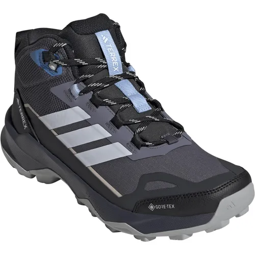 ADIDAS TERREX SKYCHASER AX5 MID GORE-TEX Damen Wanderschuh Gr. 42 - Diese leichten, knöchelhohen Wanderschuhe bieten dank GORE-TEX Membran zuverlässigen Schutz vor Nässe und optimale Atmungsaktivität. Ideal für jedes Terrain und Abenteuer.