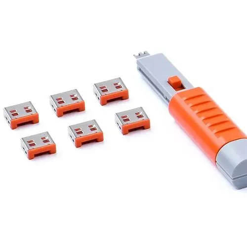 SmartKeeper Basic USB-A Port Blocker Set - 6 Stück + Schlüssel - Praktisches Set mit 6 USB-A Port Blockern in Orange, ideal zum Schutz vor unbefugtem Zugriff. Perfekt für Büros und öffentliche Plätze.