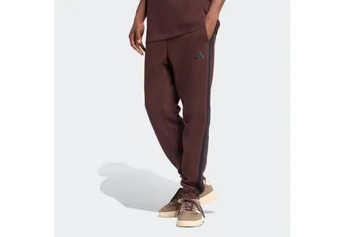 adidas Sportswear Sporthose ESSENTIALS 3-STREIFEN braun XXXL - Sportliche Hose mit elastischem Bund und Kordelzug für optimalen Tragekomfort. Ideal für Freizeit und Sport, aus hochwertiger Baumwoll-Mischung gefertigt.