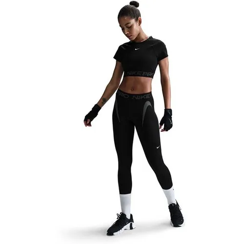 NIKE Damen Tight W NP DF MR 7/8 TT GRX - Bequeme Fitnesshose - Fitnesshosen mit kühlem Tragekomfort und hervorragender Bewegungsfreiheit. Leichtes, elastisches Material mit Mesh-Einsätzen für optimalen Komfort beim Training.