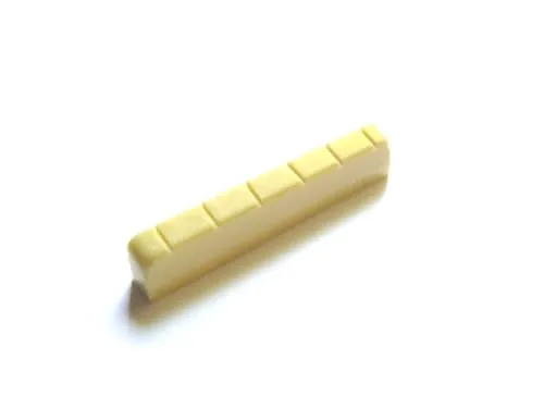 Klassik - Gitarren Sattel Kunststoff Nr.1 Maße: 52mm Breite x 6mm Fussbreite x 9mm Höhe