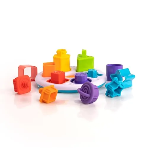 Fat Brain Toys Plugzy Shape Sorter - Taktiles Baby-Sinnesspielzeug für +10 Monate - Inklusive Basis mit 6 3D-Formen, 6 Hohlformen, 6 Silikonstopfen - Kreatives Lernspielzeug für Babys und Kleinkinder