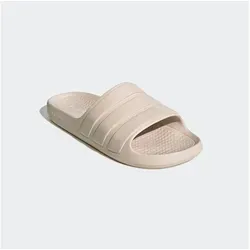 adidas Sportswear FLOW ADILETTE Badesandale rosa 43 EU - Badeschuhe in modischem Putty Mauve, ideal für den Strand oder Pool. Bequemer Tragekomfort und sportliches Design machen sie zum perfekten Begleiter für heiße Sommertage.