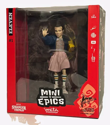 Stranger Things Mini Epics Vinyl Figur Eleven (Season 1) 14 cm - Offiziell lizenzierte Spielfigur von Eleven aus Stranger Things, ca. 14 cm groß und perfekt für Sammler. Kommt in einer bedruckten Geschenkbox und bringt einen Hauch von 80er-Jahre Nostalgie in Ihr Zuhause.