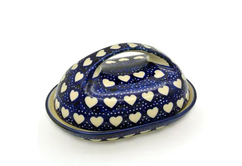 Bunzlauer Keramik Butterdose oval mit großem Griff - Elegante ovale Butterdose für 250 g Butter. Das tiefe Unterteil hält die Butter sicher an ihrem Platz, während der große Griff das Handhaben erleichtert. Hergestellt aus lebensmittelechter Bunzlauer Keramik.