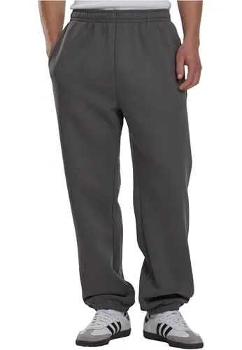 Urban Classics Herren Sporthose Basic Essential Sweatpants, lässige Freizeithose für Männer - VIELSEITIGE FREIZEITHOSE: Diese Sweatpants bieten dank Loose Fit und tapered Bein eine entspannte Passform. HOCHWERTIGE MATERIALMISCHUNG aus 50% Baumwolle und 50% Polyester sorgt für hohen Tragekomfort. Ideal für Alltag und Fitness.