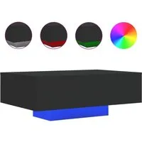 vidaXL Couchtisch mit RGB-LED-Leuchten Schwarz 85x55x31 cm - Moderner Couchtisch mit einstellbaren RGB-LED-Leuchten, der sich ideal für jedes Wohnzimmer eignet. Robuste Tischplatte aus langlebigem Holzwerkstoff für Stabilität und Feuchtigkeitsbeständigkeit.