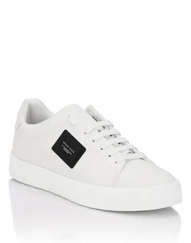 Lo-Top Turnschuhe Placca - Stilvolle Low-Top-Sneaker aus hochwertigem beschichtetem Leder, ideal für jeden Anlass. Die Gummisohle bietet Komfort und Traktion, während die minimalistische Ästhetik lässige Outfits aufwertet.