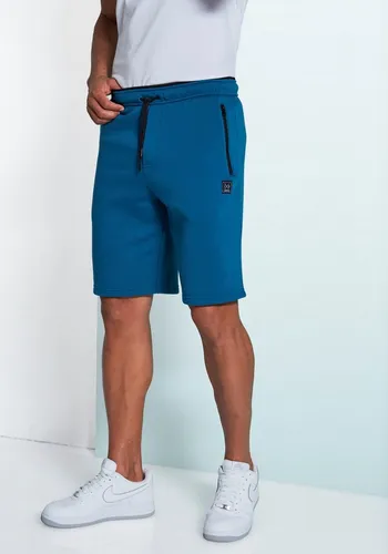 Sweatshorts JOHN DEVIN für Herren, Gr. S, petrol - Sportliche Herren-Shorts aus angerauter Sweatware mit bequemem Schnitt. Praktische seitliche Reißverschlusstaschen bieten zusätzlichen Stauraum.