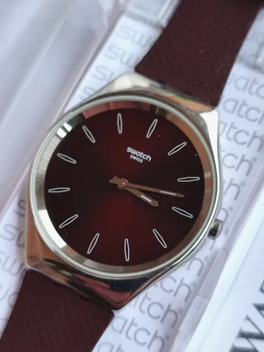 SWATCH+IRONY SKIN+SYXS120 SKINBURGUNDY+NEU/NEW von Swatch