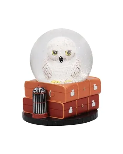 Harry Potter Hedwig Schneekugel (65mm) - Nussknacker - Offiziell lizenziertes Harry Potter Merchandise mit einer magischen Schneekugel, die Hedwig zeigt und eine stilisierte Basis hat.