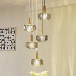 Lindby Pendelleuchte 'Hildur' - 5-flammige Hängelampe aus Glas - Stylische Pendelleuchte in rauchgrau und Messing, ideal für Essbereiche. Mit 5 Lichtern sorgt sie für eine stimmungsvolle Beleuchtung und ist ein echter Blickfang.