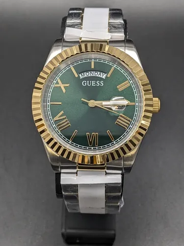 Guess Quarzuhr Connoisseur - Elegante Zeitmessung - Armbanduhren mit Quarz-Antrieb und analoger Anzeige, wasserdicht bis 5 bar. Stilvolles Design mit blauem Zifferblatt und Edelstahl-Gehäuse für jeden Anlass.