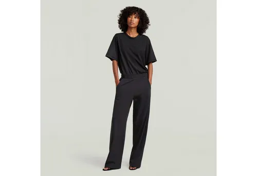 G-STAR Overall Jersey Jumpsuit – Stilvoll und Bequem - Erlebe den perfekten Mix aus Stil und Komfort mit dem G-STAR Jersey Jumpsuit. Ideal für jeden Anlass, sorgt der elastische Bund für eine schmeichelhafte Passform und Bewegungsfreiheit. Hergestellt aus 100% Bio-Baumwolle für ein angenehmes Tragegefühl.