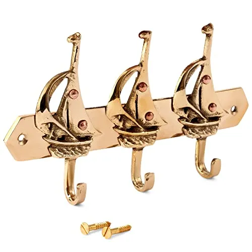 Schlüsselhaken Segelbote 3-fach Messing gold - Maritimer Schlüsselhalter aus hochwertigem Messing, bietet Platz für mehrere Schlüssel und verleiht Ihrem Eingangsbereich einen stilvollen Akzent.