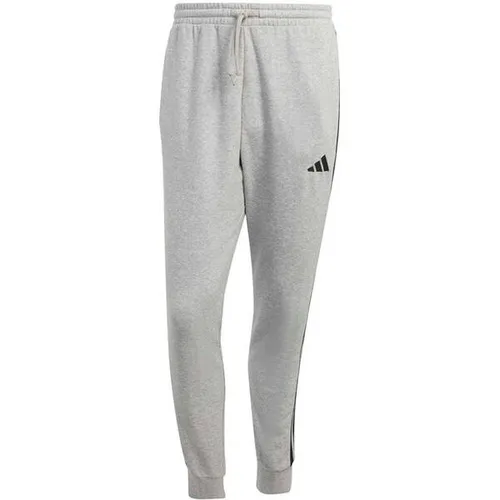 adidas Herren Essential Three Stripes French Terry Pant, XXL - Trainingshose aus weichem French Terry, schmal zulaufende Beinform und besteht zu mindestens 70 % aus recycelten Materialien - ideal für umweltbewusste Sportler.