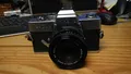 Produktbild: Foto Kamera Minolta SRT202 mit Minolta MC Rokkor PF 1:2 f=50mm
