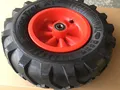 Produktbild: Berg Gokart Zubehör Rad mit roter Felge für Traxx Farm  4.00/140-8 rechts vorne