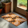 Produktbild: BRUBAKER Fußmatte für Außen und Innen - Blättermuster Schwarz und Weiß - 45 x 75 cm Schmutzfangmatte aus Kokos - Wetterfest und rutschfest - Antirutsch Türvorleger mit Blatt Design - Braun