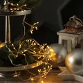 Produktbild: LED Lichterkette Pusteblume - Feuerwerk Blume - 90 Tautropfen LED - 9 Blüten - L: 2m - Timer - gold