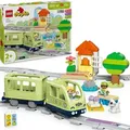 Produktbild: LEGO DUPLO Interaktive Abenteuer-Eisenbahn - Lernspielzeug für Kleinkinder ab 2 Jahren – 14 Gleisstücke, Aktionssteine mit Geräuschen und 4 Sp... - Bunt