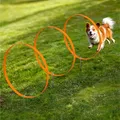 Produktbild: Navaris 3X Ring Agility Set Hunde klein und mittelgroß - 3er Hunde Agility Set - 3 Ringe für Hundesport Hundeparcour - Hunde Training Zubehör - Agility Hund Ringe - Orange